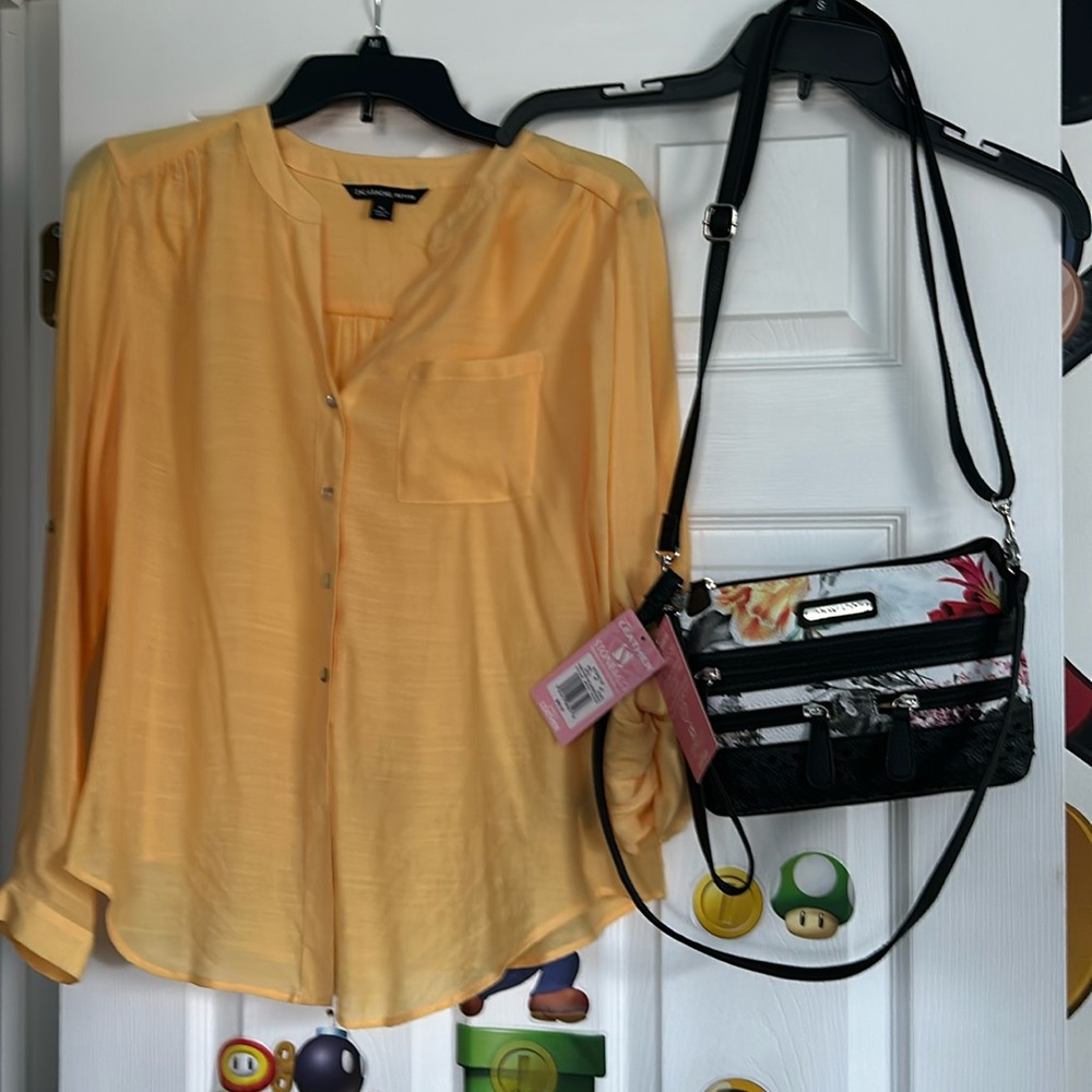 Beautiful yellow top with gorgeous leather purse to match!